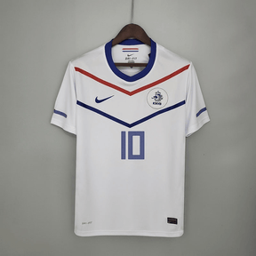 Camisola Holanda Away 12/13 Retro em branco com detalhes em azul e vermelho, número 10, da Nike.