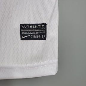 Etiqueta de autenticidade da camisola Holanda Away 12/13 Retro, mostrando especificações de qualidade Nike.