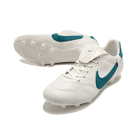Chuteira Nike Premier 3 FG Branca e Verde em destaque, mostrando design clássico e estrutura de couro premium.