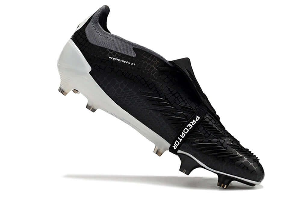 Chuteira Adidas Predator Elite Tongue FG - Preta e Branca com design moderno e tecnologia avançada.