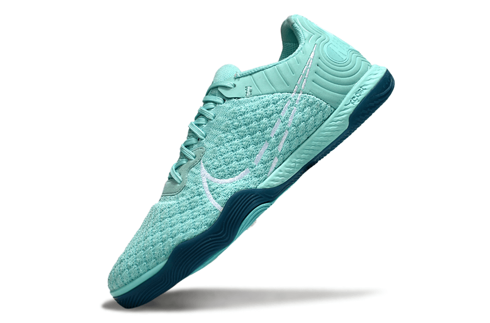 Chuteira Futsal Nike React Gato IC - Azul Oceano com design inovador e tecnologia de amortecimento.