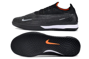 Chuteira Futsal Nike Gripknit Phantom GX Elite IC, vista lateral e sola, design moderno e desempenho em quadra.