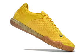 Chuteira Futsal Nike React Gato IC - Amarela com design inovador e tecnologia de amortecimento responsivo.