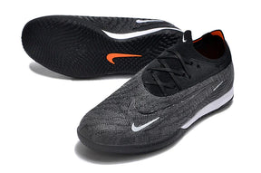 Chuteira Futsal Nike Gripknit Phantom GX Elite IC com design inovador e solado aderente para melhor desempenho.