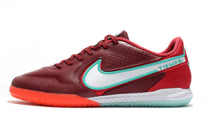 Chuteira Futsal Nike Tiempo Legend 9 Elite IC Vermelho com detalhes em azul e sola laranja.