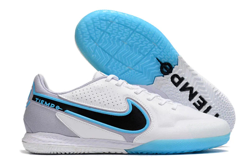 Chuteira Futsal Nike Tiempo Legend 9 Elite IC Branco e Azul, ideal para jogos em quadra com alta performance.