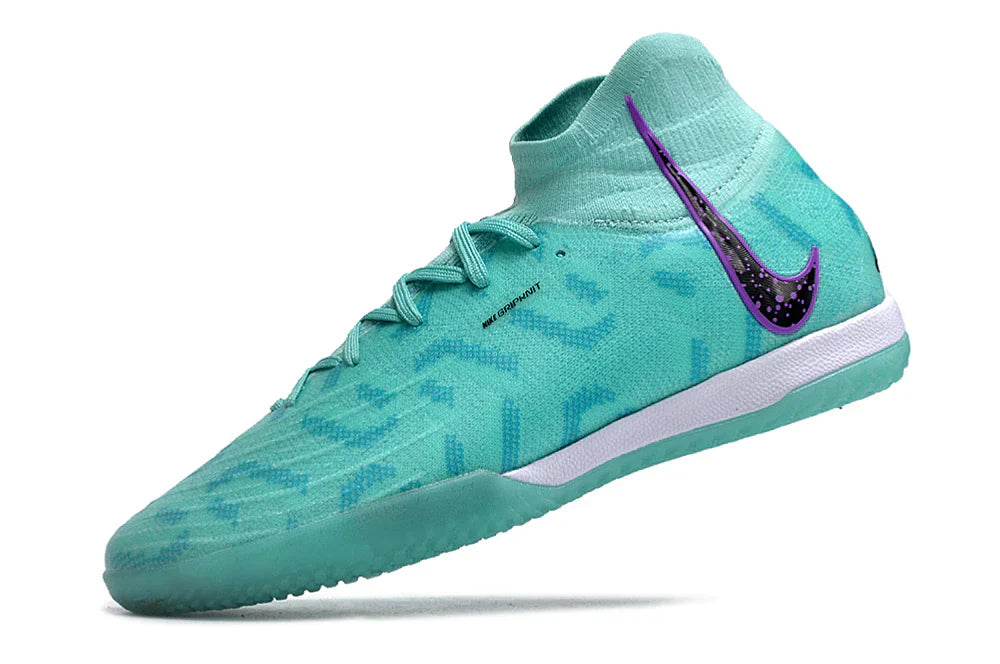 Chuteira Futsal Nike Phantom Luna Elite IC na cor verde água com detalhes roxos.