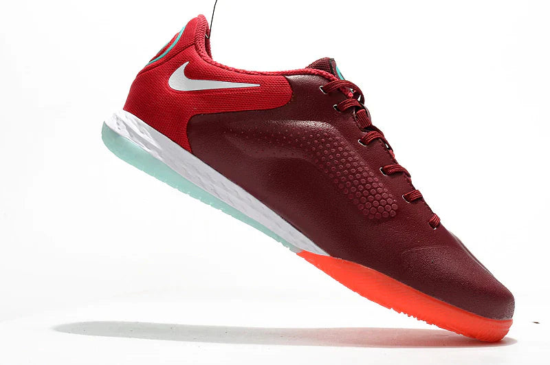 Chuteira Futsal Nike Tiempo Legend 9 Elite IC Vermelho com design elegante e cores vibrantes.