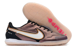 Chuteira Futsal Nike Tiempo Legend 9 Elite IC Bronze com solado transparente e design moderno.