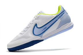 Chuteira Futsal Nike Tiempo Legend 9 Elite IC em branco e azul, ideal para performance interna e conforto.