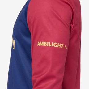 Camisola Manga Longa Nike FC Barcelona 2024/25 torcedor com detalhes em azul e vermelho.