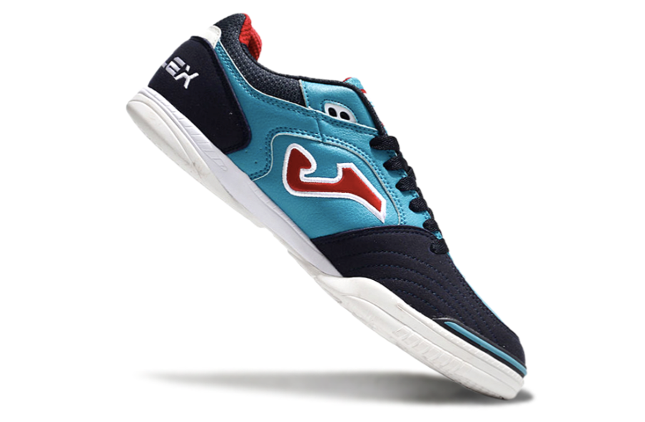 Chuteira de Futsal JOMA IC Verde e Vermelha em destaque, ideal para melhorar desempenho no jogo.