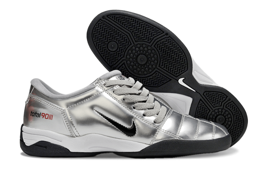 Chuteira Futsal Nike Total 90 IC Prata com design prateado e sola IC para quadras indoor.