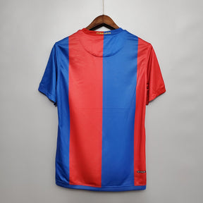 Camisola de futebol Barcelona 06/07 nas cores vermelho e azul, vista traseira, disponível na OLYMPIC STORE.