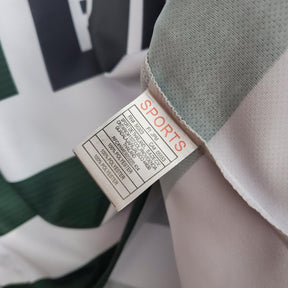 Etiqueta de composição da camisola Sporting Lisboa Home 01/03 Retro mostrando material e instruções.