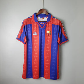 Camisola Barcelona Home 96/97 Retro Olympic Store com design icônico, ideal para colecionadores e fãs.