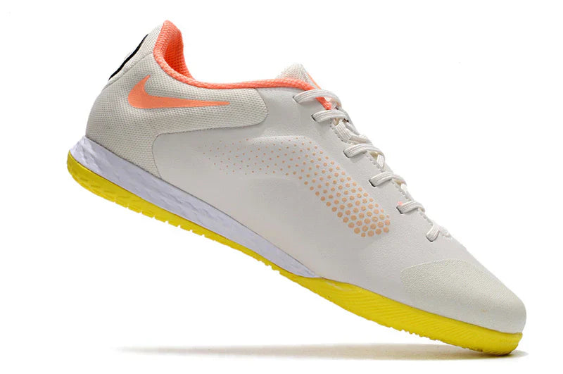 Chuteira Futsal Nike Tiempo Legend 9 Elite IC Branco com design moderno e sola amarela.