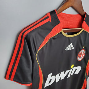 Camisa AC Milan 2006 Retro Black Olympic com detalhes em vermelho e logo adidas.
