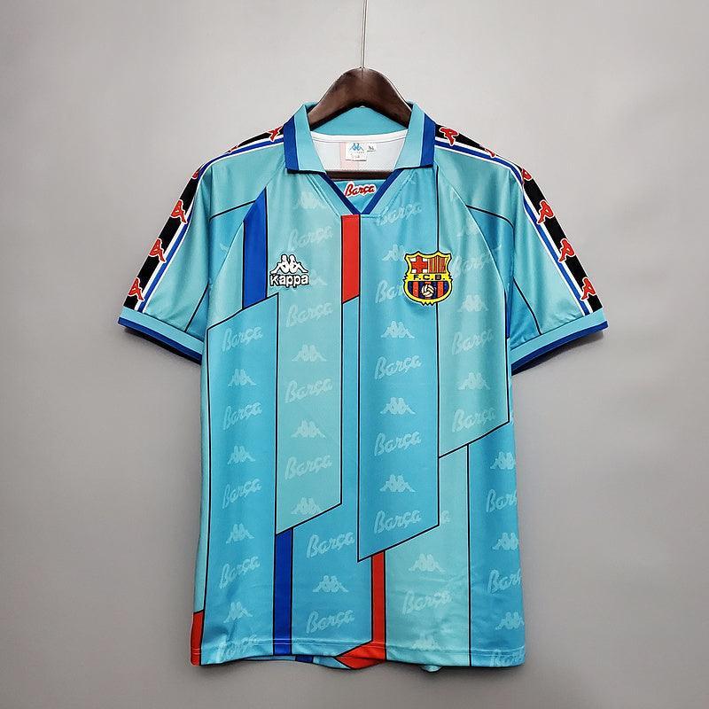 Camisa Barcelona third Retro 96/97 com design exclusivo, detalhes em azul e vermelho, logotipo Kappa.