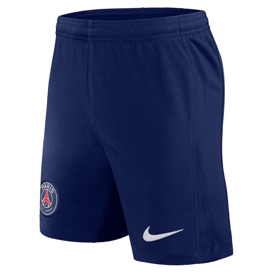 Conjunto Infantil PSG Home 24/25 - Calções de futebol Nike em azul marinho com logo do PSG.