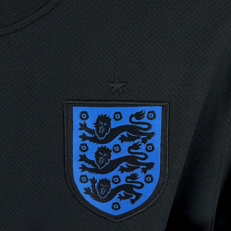 Camisola Inglaterra com escudo azul e leões, edição especial 25/26, OLYMPIC STORE.