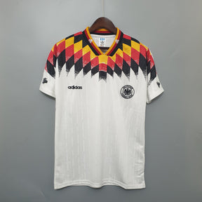 Camisola Alemanha Home 1994 Retro com design icônico em cores da bandeira da Alemanha, da marca Adidas.
