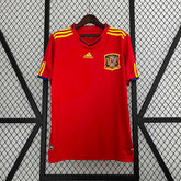 Camisola Espanha home 2010 Retro da Adidas, modelo vermelho com detalhes em amarelo, ideal para torcedores.