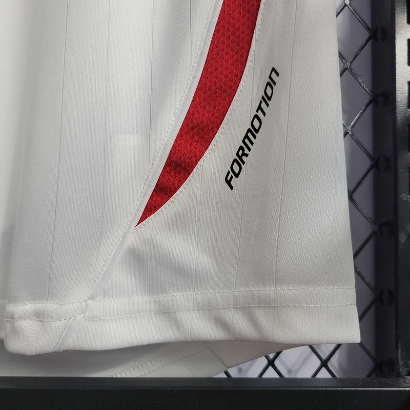 Camisola França away 2006 Retro com detalhes em vermelho, marca FORMATION visível na lateral.