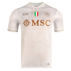 Camisola Napoles alternativo branca 2025/26 com detalhes em dourado e logo do Napoli.