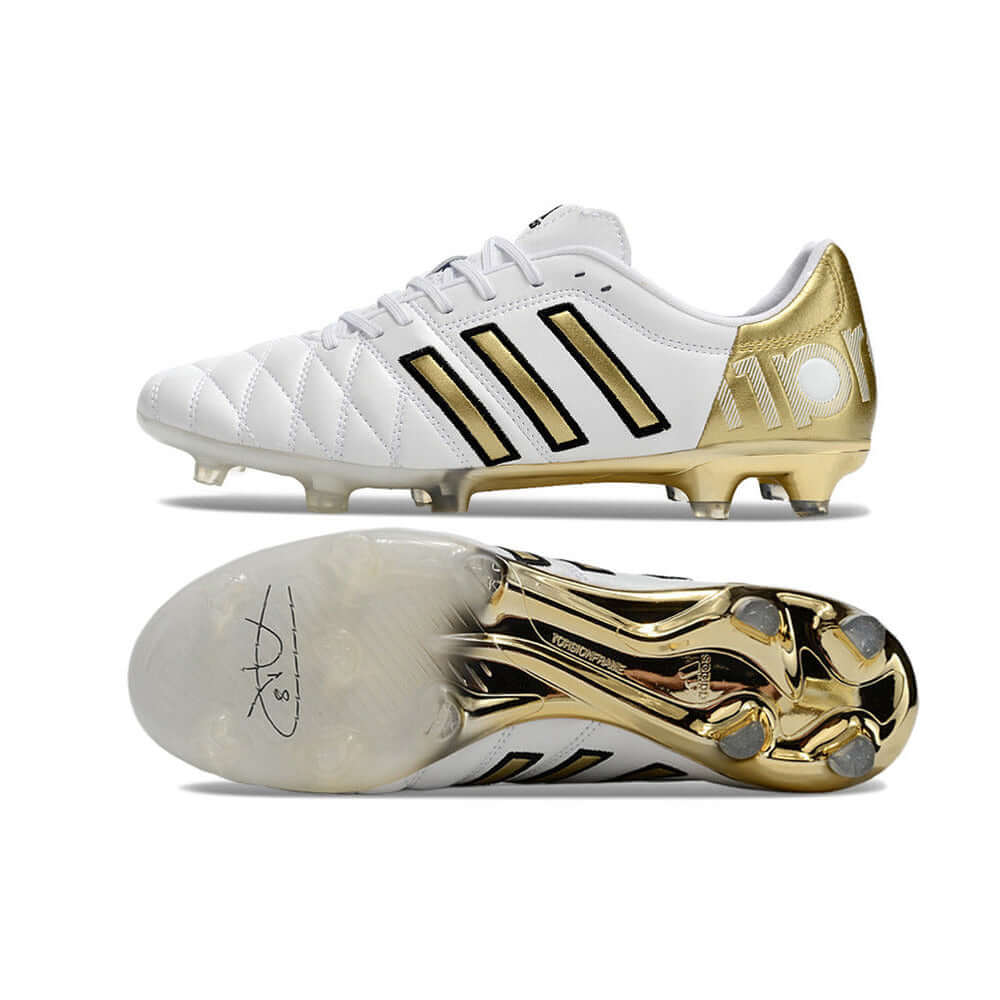 Chuteira Adidas AdiPure 11 Pro FG Branca Dourada com design elegante em branco e dourado.