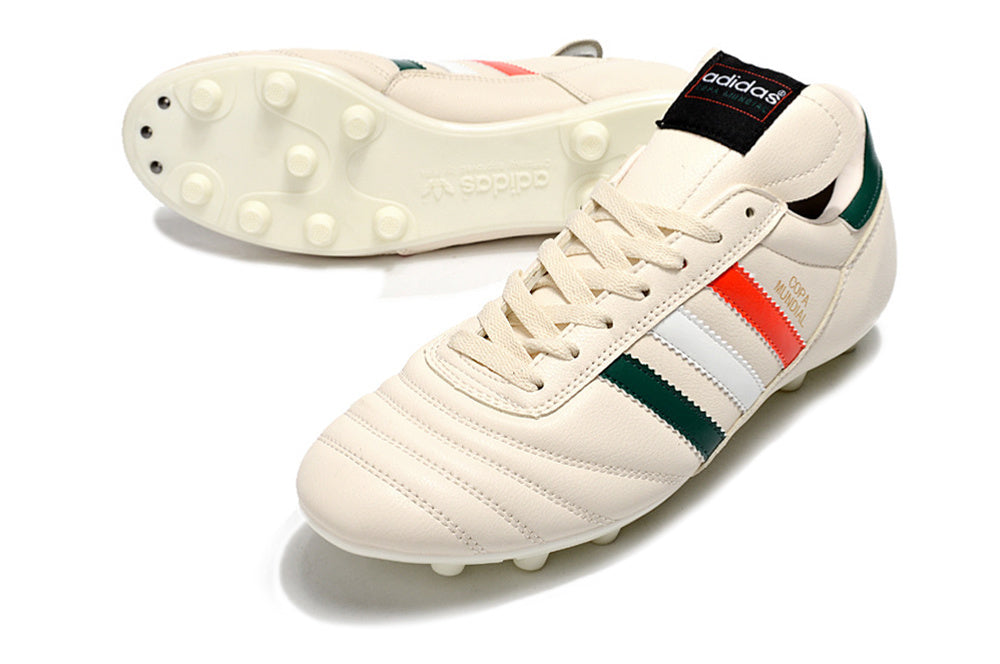 Chuteira Adidas Copa Mundial FG Bege, Vermelha e Preta com design tricolor e solado para gramados naturais.