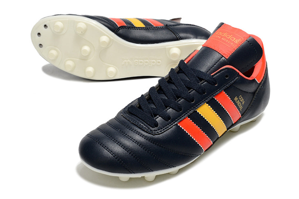 Chuteira Adidas Copa Mundial FG Preta, Vermelha e Amarela com design clássico e cores vibrantes