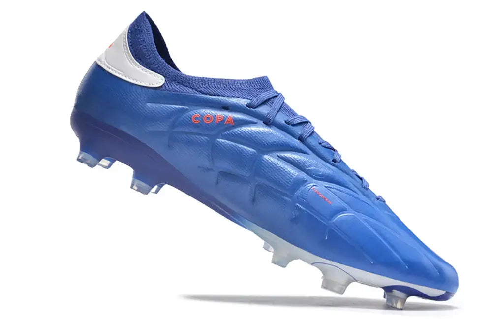 Chuteira Adidas Copa Pure+ FG Azul, oferecendo conforto e alta performance em campo com design vibrante.