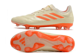 Chuteira Adidas Copa Pure+ FG Laranja com design vibrante e solado otimizado para desempenho em campo.