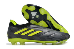 Chuteira Adidas Copa Pure+ FG Preta e Verde, ideal para controle e precisão no campo.