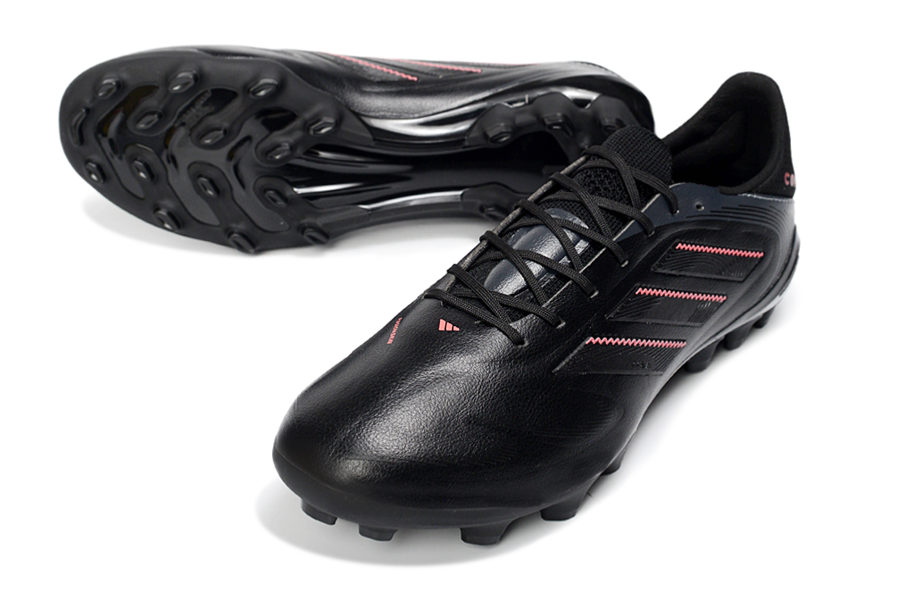 Chuteira Adidas Copa Pure III Elite AG - Preta em vista lateral com detalhes em coral e sola AG destacada.
