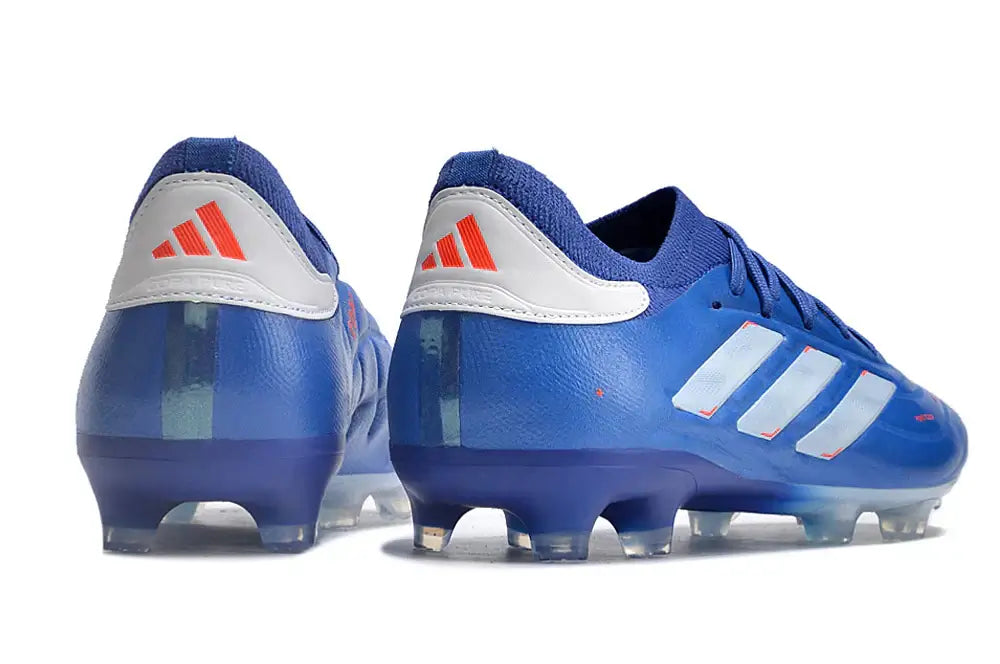Chuteira Adidas Copa Pure+ FG Azul com design vibrante e tecnologia de desempenho para jogadores em campo.