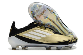 Chuteira Adidas F50.1 FG Dourada, Preta e Branca com detalhes brancos e sola transparente.