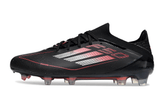 Chuteira Adidas F50 Elite FG - Preta e Vermelha lateral com design elegante em preto e vermelho, ideal para desempenho em campo.