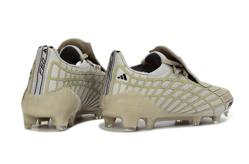 Chuteira Adidas F50 Elite FG Spider Dourada, modelo de prestígio com design luxuoso e tecnologia avançada.