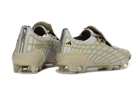 Chuteira Adidas F50 Elite FG Spider Dourada, modelo de prestígio com design luxuoso e tecnologia avançada.