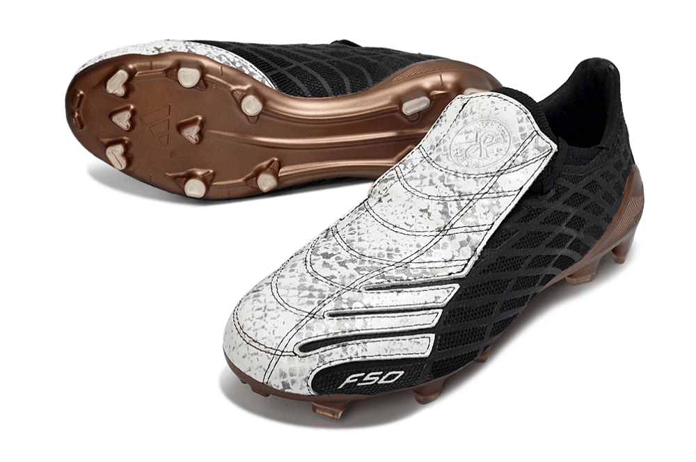Chuteira Adidas F50 Elite FG Spider Preta e Branca com design avançado e sola de tração para futebol.