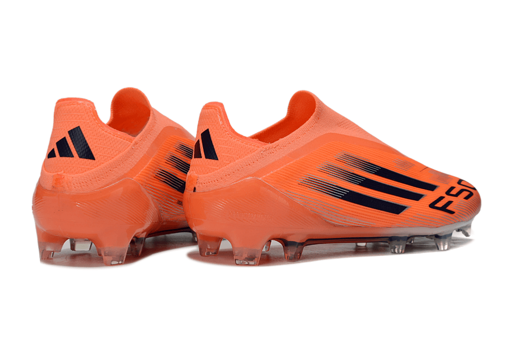 Chuteira Adidas F50 FG Elite Laranja e Preta - visão traseira dos tenis de futebol laranja