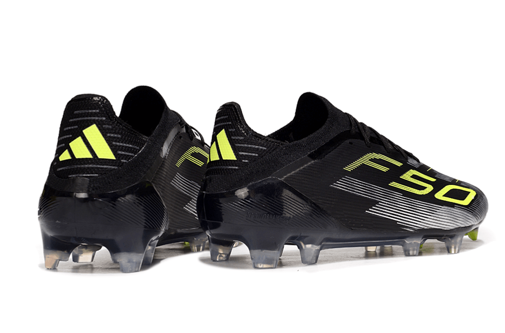 Chuteira Adidas F50 FG Elite Preta e Amarela com design moderno e tecnologia avançada para desempenho em campo.