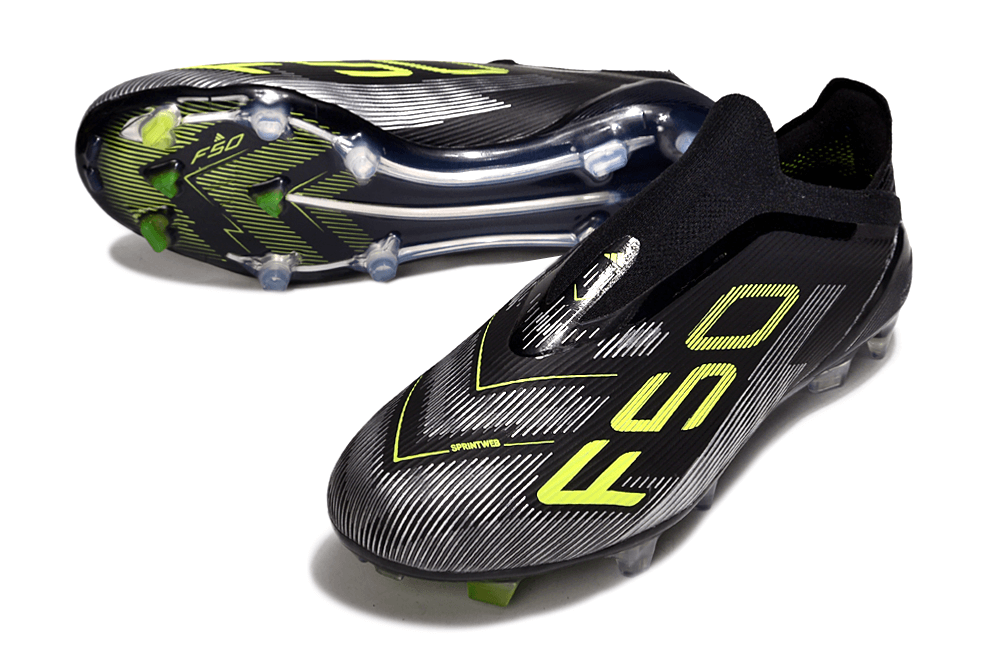 Chuteira Adidas F50 FG Elite Preta com design moderno e amarela, ideal para desempenho em campo.