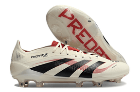 Chuteira Adidas Predator Elite FG - Bege, Preta e Vermelha em ângulo com sola exposta para destaque em gramados.