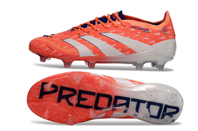 Chuteira Adidas Predator Elite FG - Laranja com design vibrante e sola FG para controle em campos de futebol.