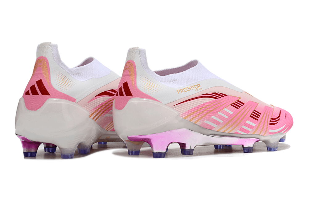 Chuteira Adidas Predator Elite FG LL - Rosa com design vibrante e tecnologia avançada, perfeita para jogos em gramados naturais.