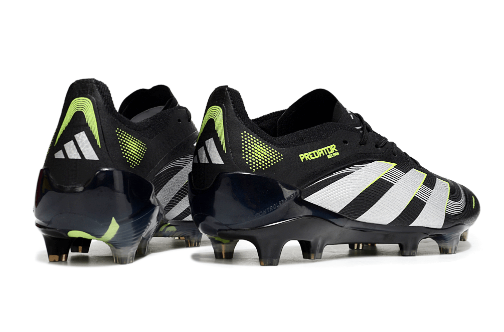 Chuteira Adidas Predator Elite FG - Preta e Amarela com design icônico e tecnologia de ponta para controle e precisão.