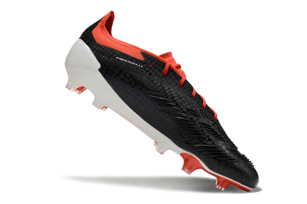 Chuteira Adidas Predator Elite FG - Preta, Branca e Laranja em posição de destaque com design inovador.